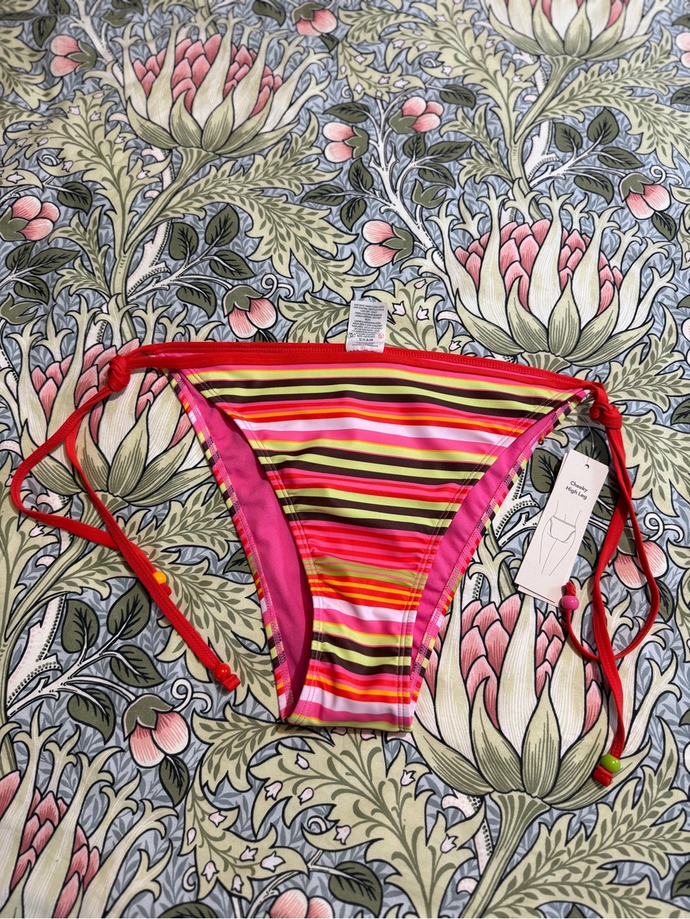 No Boundaries Pink Bikini Bottom with Red Trim and Floral Print